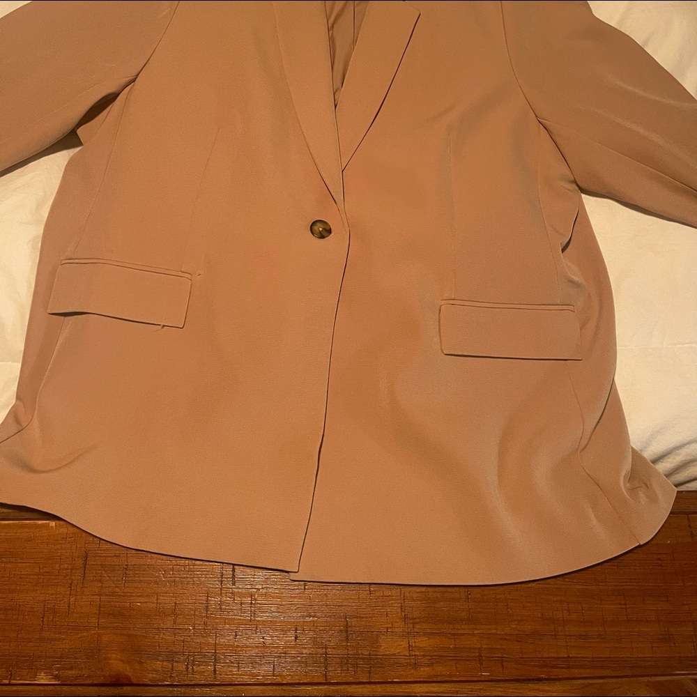 Woman’s casual blazer tan